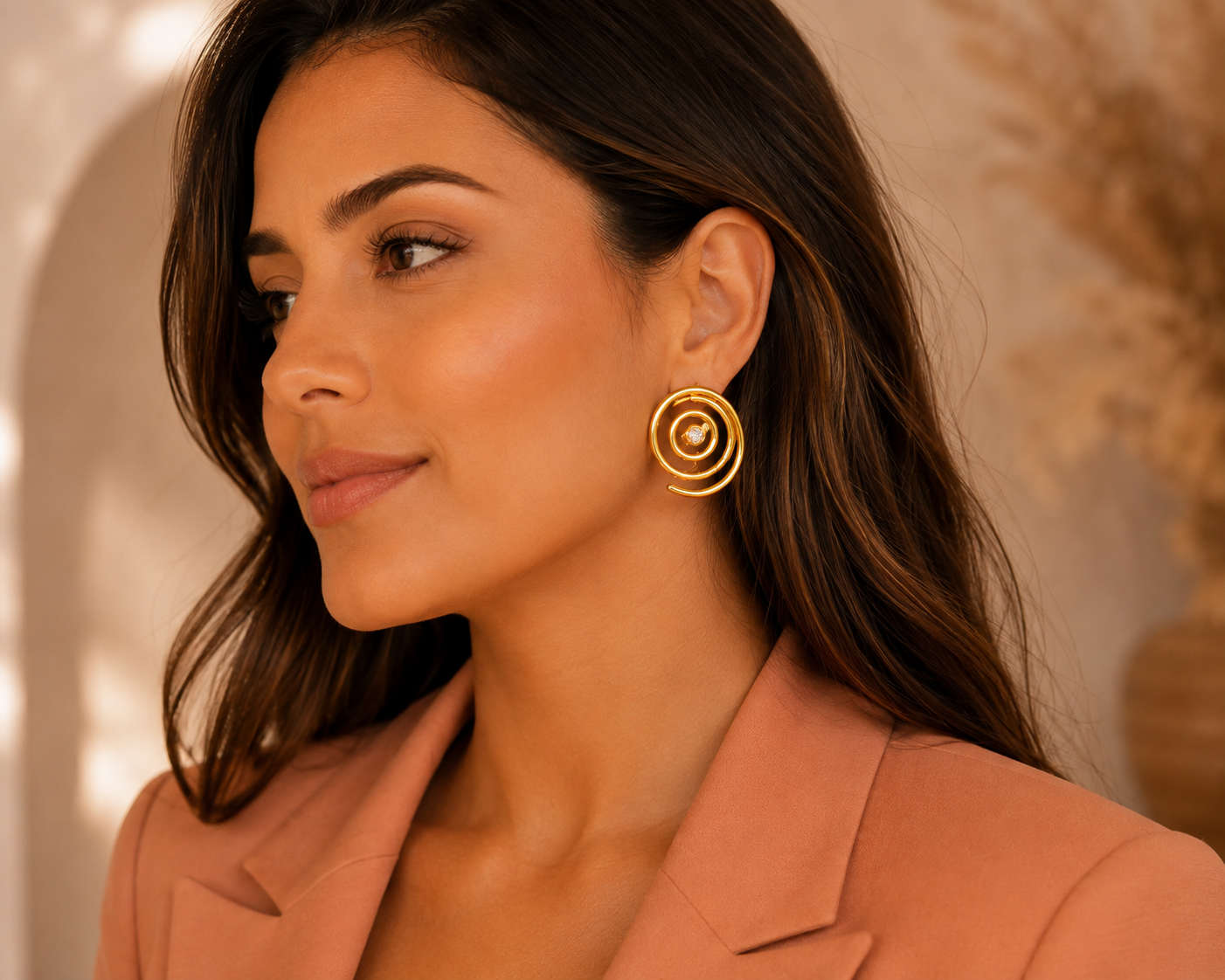 Stainless Steel 18K Gold Plated Spiral Fashionable Stud Earrings.