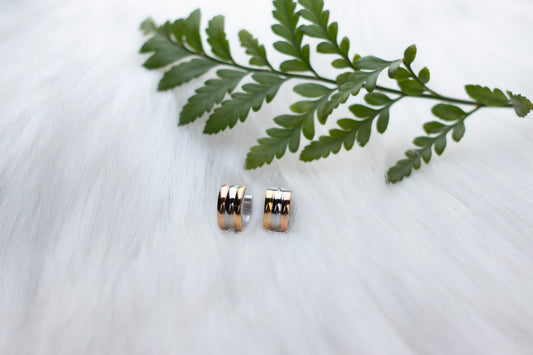 Aztec Allure Tri-Toned Stainless Steel Huggie Earrings.