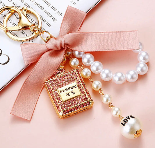 Pink Bow Knot Perfume Bottle Metal Keychain.